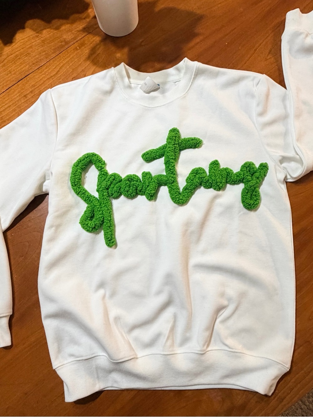 White Crewneck Sweater with Green Script Appliqué